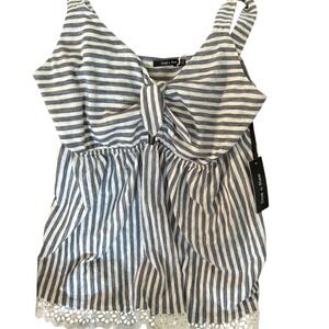 Tank with peek a boo hole near the center